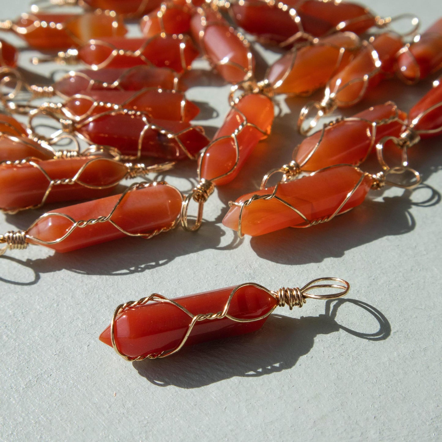 carnelian, carnelian pendant, carnelian jewelry, crystal pendant, gemstone pendant, carnelian crystal, carnelian stone, carnelian gemstone, carnelian properties, carnelian healing properties, carnelian metaphysical properties, carnelian meaning