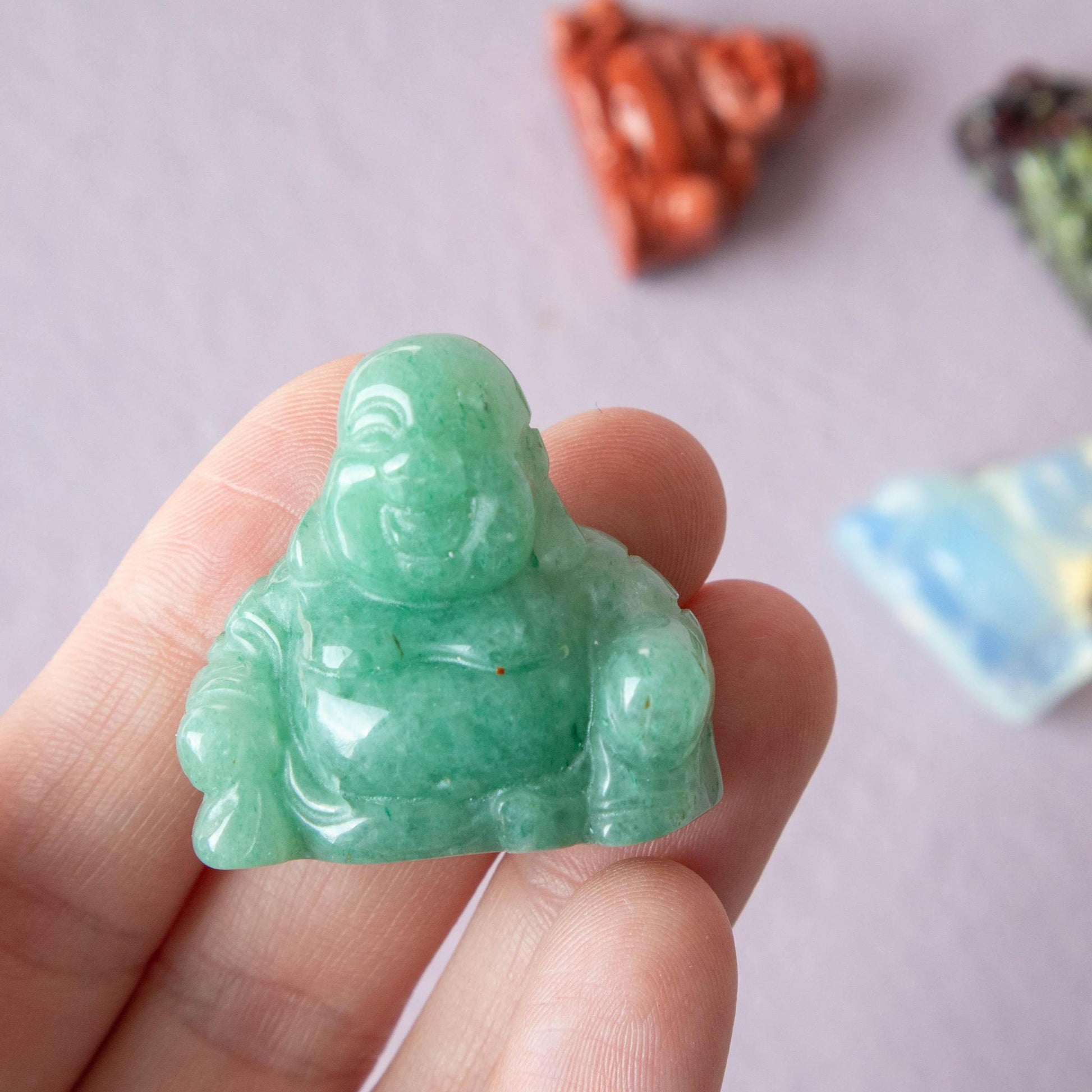 green aventurine, green aventurine buddha, green aventurine buddha carving, green aventurine happy buddha, happy buddha crystal, green aventurine crystal, green aventurine stone, green aventurine properties, green aventurine healing properties, green aventurine meaning