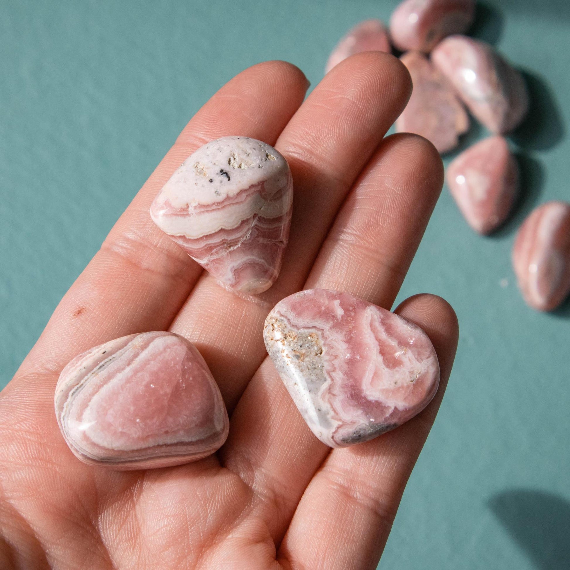 rhodochrosite, rhodochrosite tumble, rhodochrosite tumbled stone, crystal tumble, small crystal tumble, small tumbled stone, rhodochrosite crystal, rhodochrosite stone, rhodochrosite properties, rhodochrosite healing properties, rhodochrosite metaphysical properties, rhodochrosite meaning