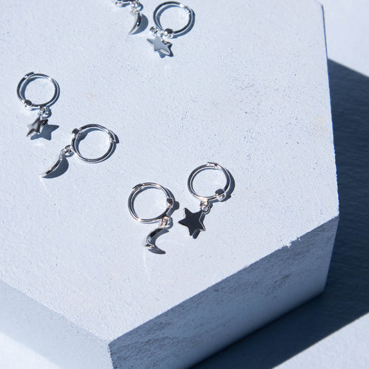 sterling silver, sterling silver earrings, sterling silver jewelry, sterling silver huggie hoop earrings, moon and star earrings, moon and star jewelry, moon earrings, star earrings