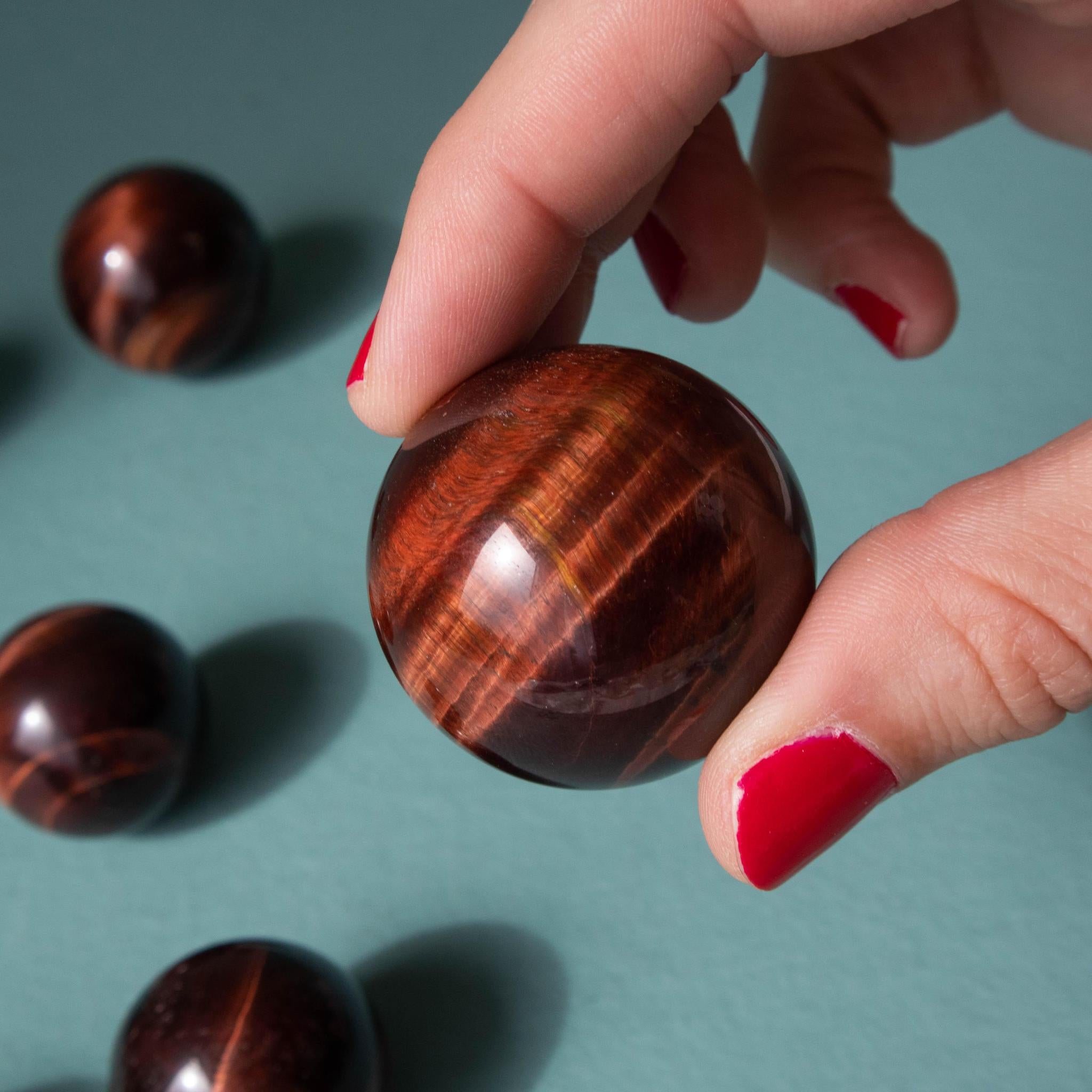 Red hot Tigers Eye Small Sphere 39MM 3.1 ounces