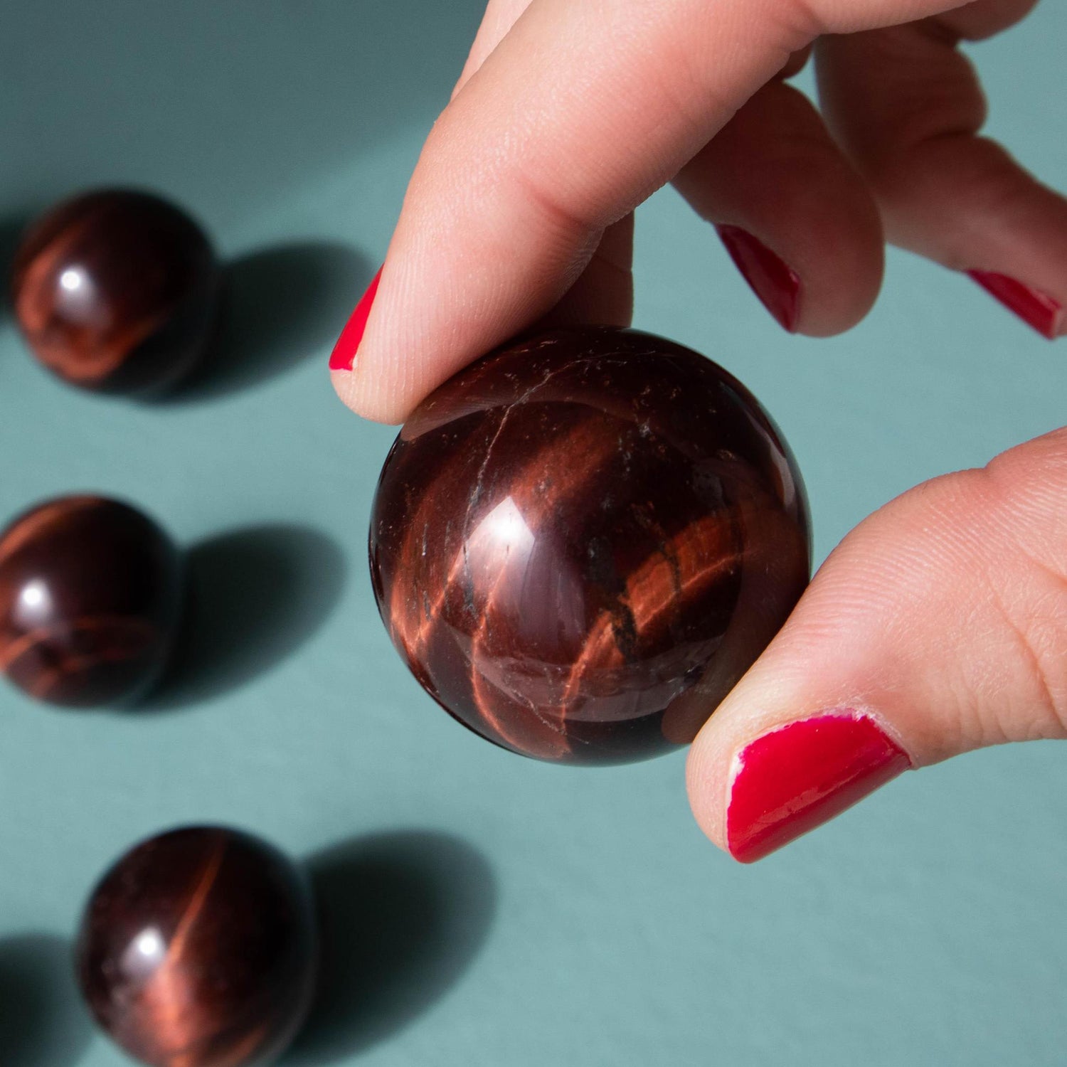 Red Tigers Eye Sphere – Kailua Crystals